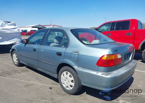 1999 Honda Civic Lx from USA, damaged, VIN 1HGEJ667XXL013276